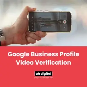A hand holds a smartphone recording a video outdoors; text below reads, "Google Business Profile Video Verification," highlighting the process for verifying your business, with the "ah digital" logo.