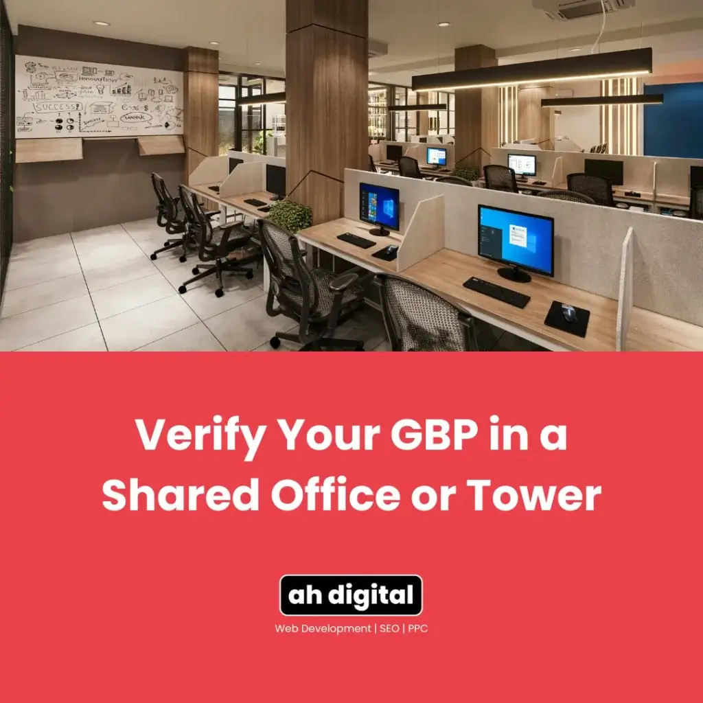 Modern shared office with computers, desks, chairs, and a whiteboard above a red banner reading “Verify Your GBP in a Shared Office or Tower.”